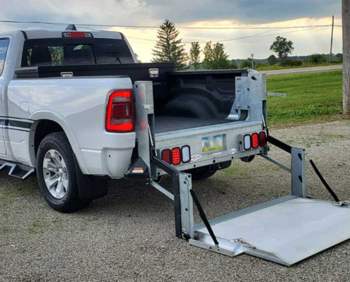 Lift Gate on Ground Behind Pickup Truck